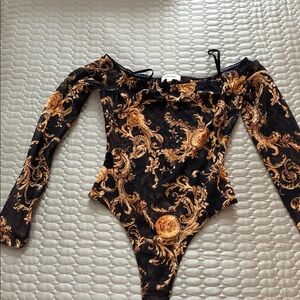 L'AGENCE Black and Gold Baroque Off-Shoulder Bodysuit